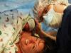 Mother, father and newborn baby